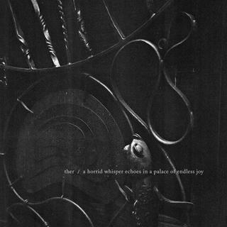 black and white close up photo of a fish ornament in a wrought iron gate